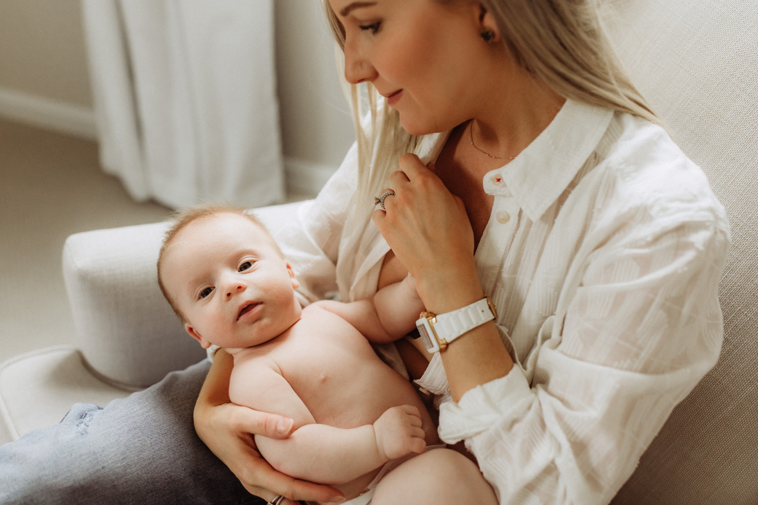 Mother Breastfeeding Son in an Armchair